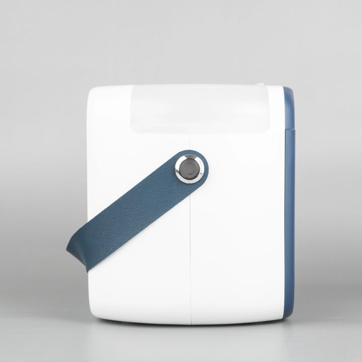 Blue and white air cooler equipped with a handle for easy transport