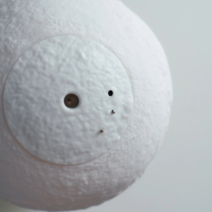 Moon lamp humidifier designed as a white sphere with perforations
